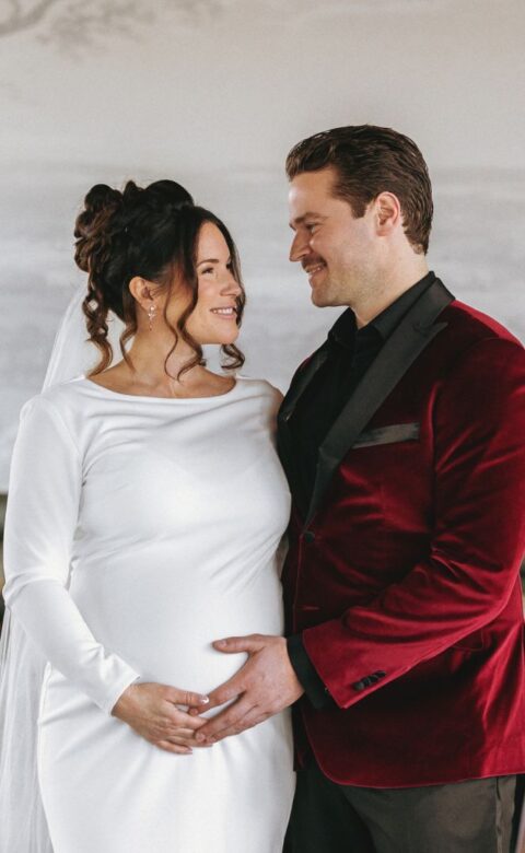 a man and a woman standing next to each other