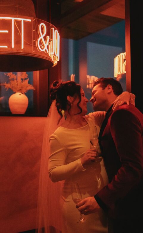 a man and woman standing next to each other